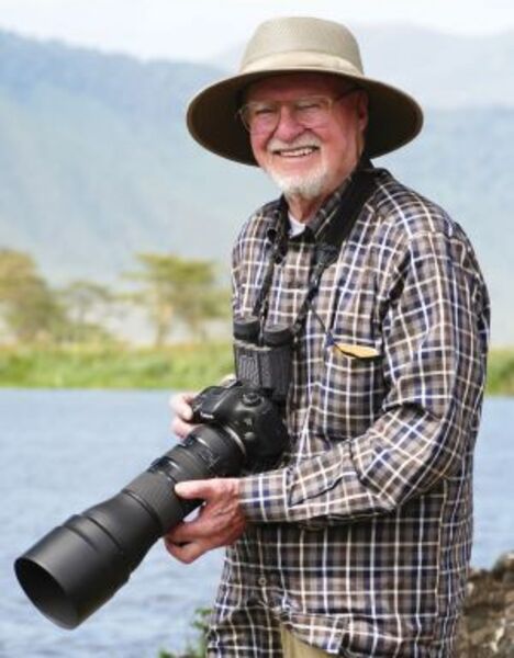 Charles Sleicher holding his camera