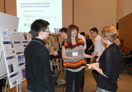 6ixS answering questions from a judge at the Science and Technology Showcase