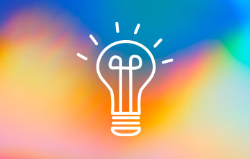 Lightbulb icon in front of colored background