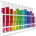 test tubes filled with liquids in rainbow pattrn
