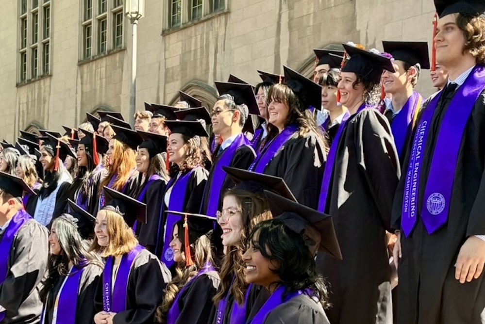 Undergraduate students pose for a class photo.