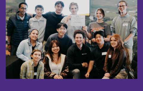 Students from the UW ChemE Car Team accept their first-place award in the poster competition.