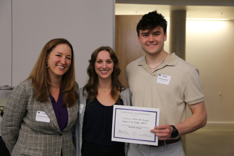 Team members from "Automation of Chemical Ortho-Phosphate Removal" hold their certificate and stand with Dept. Chair Elizabeth Nance.