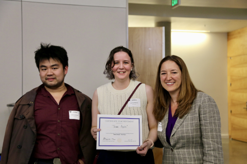Team members from Apple^4 hold their certificate with Dept. Chair Elizabeth Nance. 
