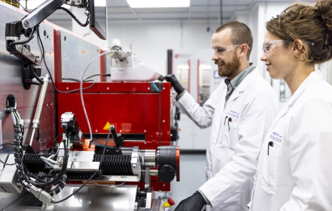 Washington Clean Energy Testbeds staff scientists fabricate battery electrodes by the meter using the state-of-the-art roll-to-roll coater in the new lab for pilot-scale pouch cell battery manufacturing.
