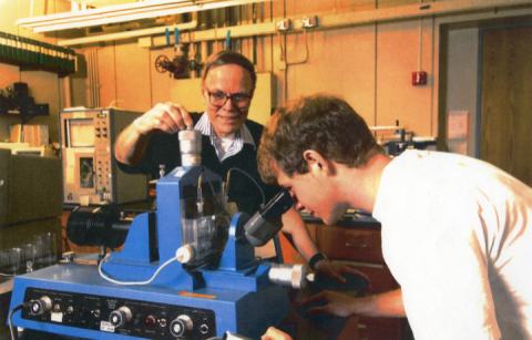 John Berg working with a student in his lab